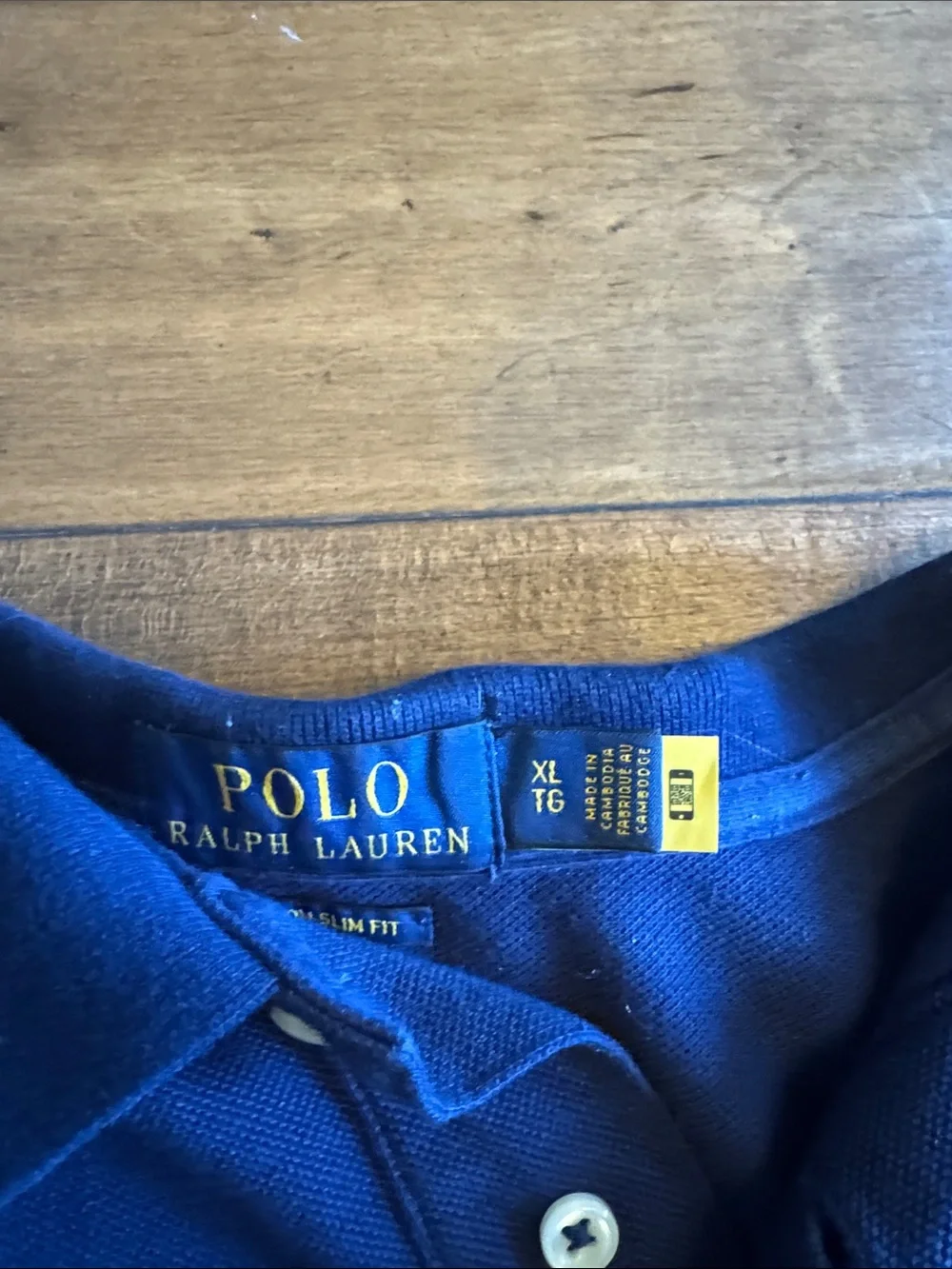 Ralph Lauren Navy Blue Polo Shirt with White Pony Logo.